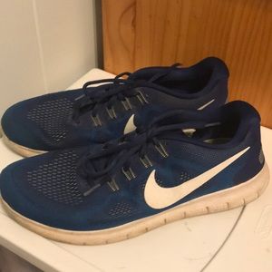 Nike free run tennis shoes.